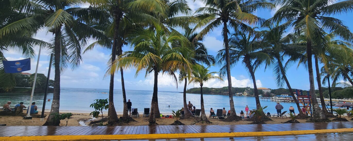 Beachfront scenery at West End in Roatan, Honduras, with turquoise waters