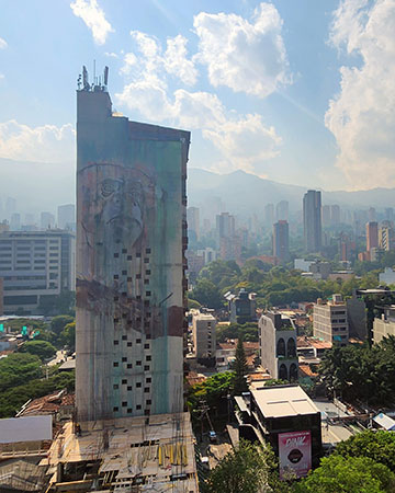 Panoramic view of Medellin, Colombia skyline with mountain backdrop